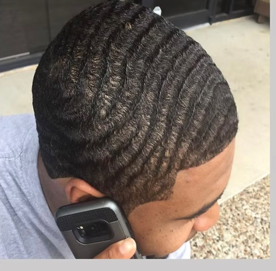 Deep 360 waves with a clean lined-up hairline after a Supreme Chop cut, wash and wrap